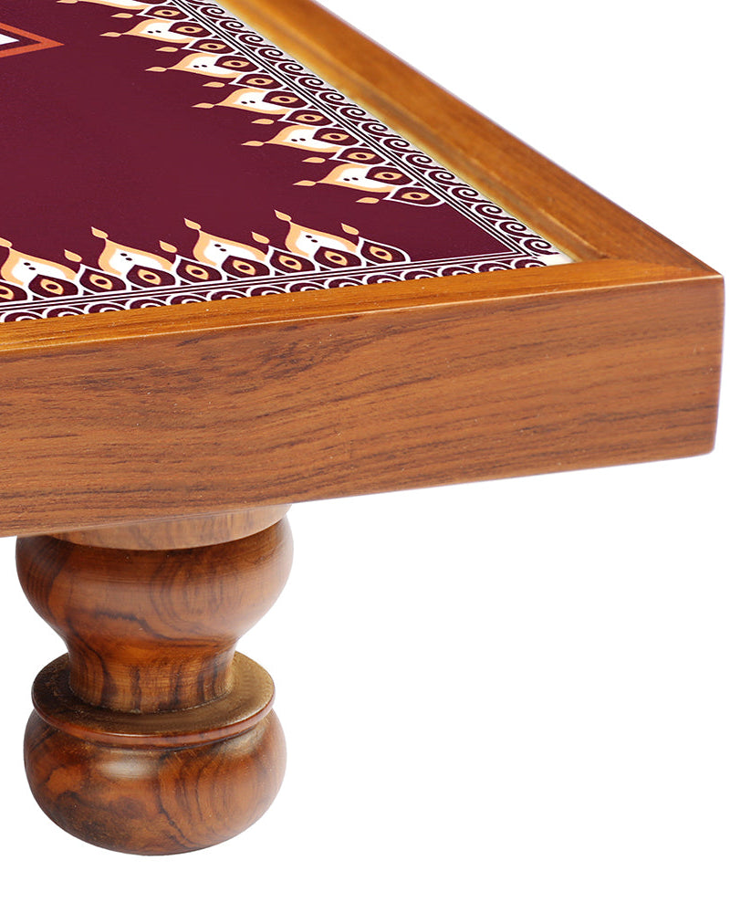Elevate your home decor with the Traditional Maroon Mandala Bajot, meticulously crafted from Teak Wood and adorned with Serenity Mandala Art. Whether used for decorating your home, conducting Pooja ceremonies, or creating festive vibes, this piece, known as Chowki or Pattla, adds cultural richness and beauty to your space.