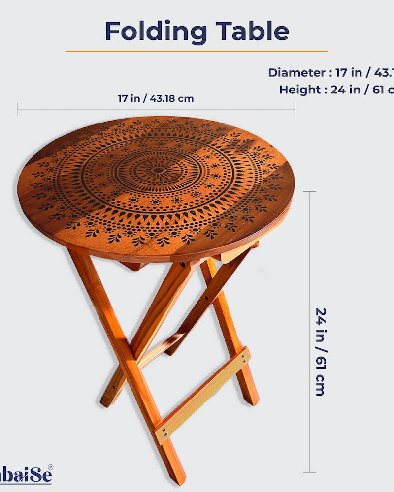 Introducing the Blooming Teak Round Folding Table ‰ÛÒ a fusion of Mandala Art and 100% Teak Wood craftsmanship. Ideal for use as a coffee table, sofa side table, bed side table, or balcony feature, this table adds artistic flair while being easy to clean and maintain.