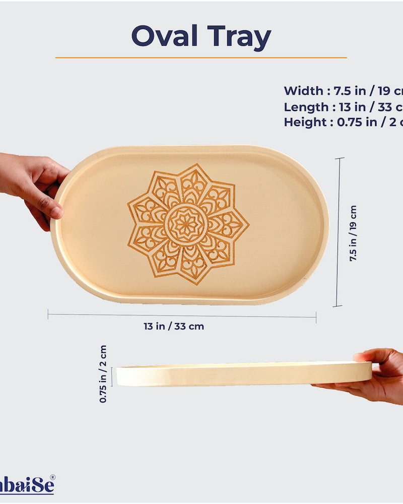 Introducing the Ivory White Oval Tray ‰ÛÒ a light-weight and stylish solution for your serving, organizing, and decor needs. Crafted from Premium Painted Wood and sized at 13" x 7.5" x 0.75"H.