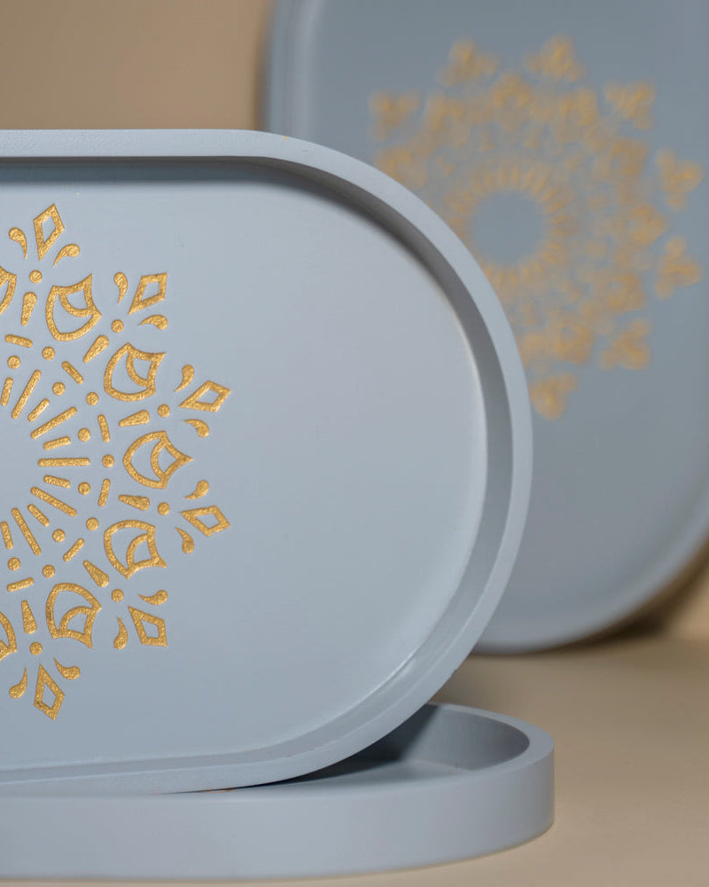 Step into refined living with the Pebble Grey Oval Tray (medium), meticulously designed from light-weight Premium Painted Wood. Adorned with Serenity Mandal Art.