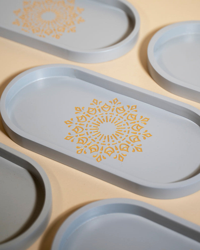 Discover the perfect blend of style and function with our Pebble Grey Oval Tray. Crafted from Premium Painted Wood, this light-weight and versatile tray, adorned with Serenity Mandala Art, is designed for serving, organizing, and adding a touch of decor to your space.