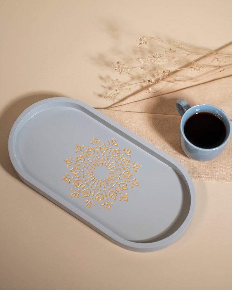 Experience the artistry of organization with our Pebble Grey Oval Tray, made from Premium Painted Wood. This light-weight tray, adorned with Serenity Mandala Art, serves as a versatile solution for serving, organizing, and adding a decorative touch to any room.