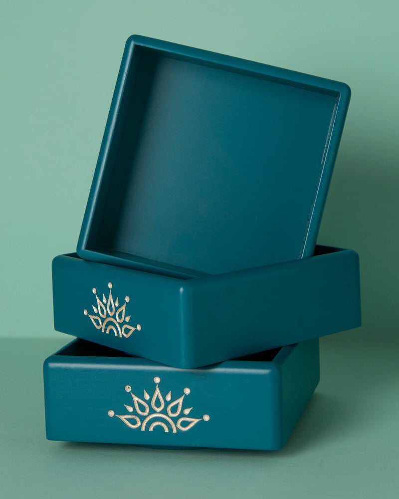 Elevate your organization game with the Blue Revolving Jar Tray Organizer, meticulously crafted from Premium Painted Wood.