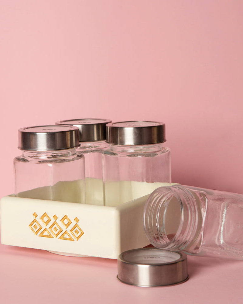 Bring order to the chaos with our Off White Revolving Jar Tray Organizer, expertly crafted from Premium Painted Wood. Designed to organize four jars while rotating 360 degrees, this versatile piece is perfect for kitchen, living room, or dining table use. Featuring Serenity Mandala Art, it adds a touch of elegance to practicality.
