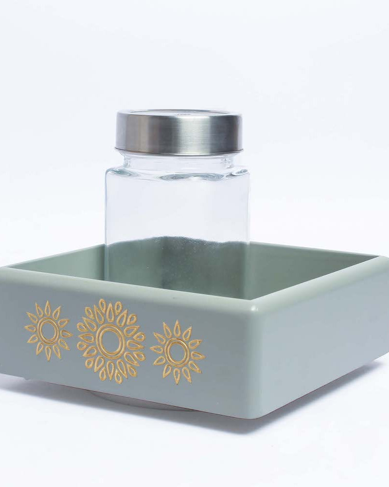 Elevate your organizational prowess with the Grey Revolving Jar Tray Organizer, meticulously crafted from Premium Painted Wood. Featuring Serenity Mandala Art, this stylish piece effortlessly organizes four jars while revolving 360 degrees.