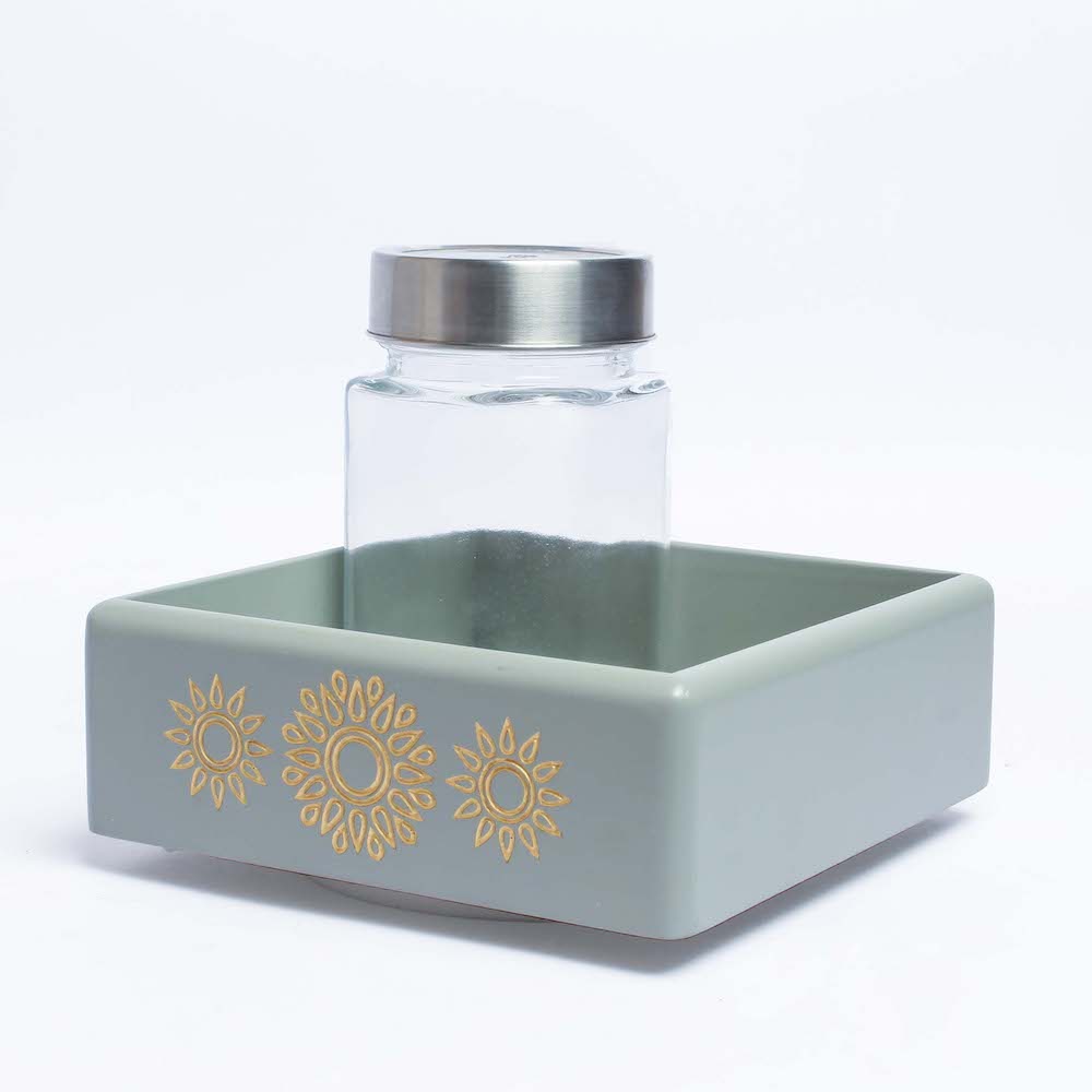 Elevate your organizational prowess with the Grey Revolving Jar Tray Organizer, meticulously crafted from Premium Painted Wood. Featuring Serenity Mandala Art, this stylish piece effortlessly organizes four jars while revolving 360 degrees.