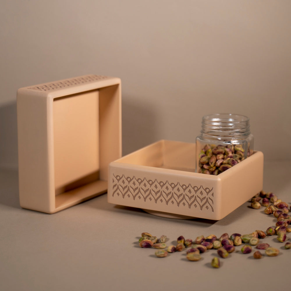 Achieve organized serenity with our Vanilla Beige Revolving Jar Tray, meticulously crafted from Premium Painted Wood. Designed to accommodate and rotate four jars seamlessly, this versatile piece is perfect for kitchen, living room, or dining table use.