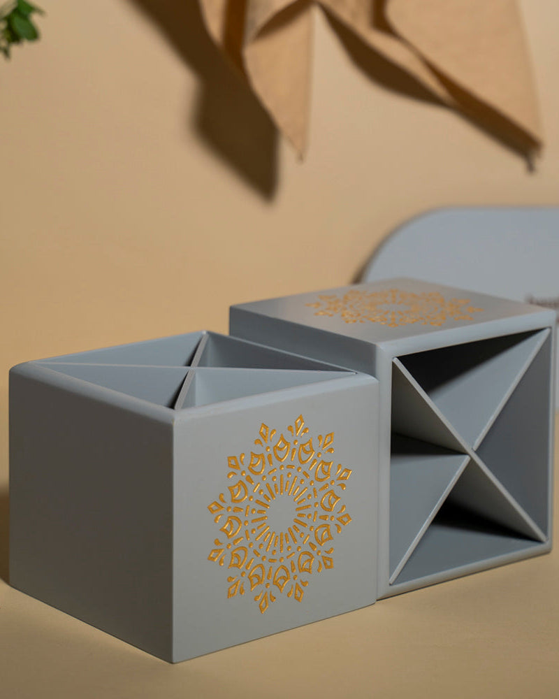 Immerse your kitchen in style with the Pebble Grey Spoon Stand, a Premium Painted Wood organizer adorned with engraved Serenity Mandal Art. Perfect for dining decor and kitchen cutlery organization, this stand's removable 4 sections ensure easy cleaning and a personalized touch to your culinary space.