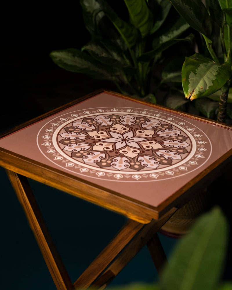 Enhance your space with the Vanilla Beige Square Coffee Table, a versatile teak wood piece with a Serenity Mandala design. Use it as a coffee table, sofa side table, bed side table, or balcony accent. Its complete foldability and easy cleaning make it a stylish and practical addition to your home.