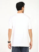Back view of a man wearing an oversized bamboo T-shirt, showcasing its loose fit and soft fabric.