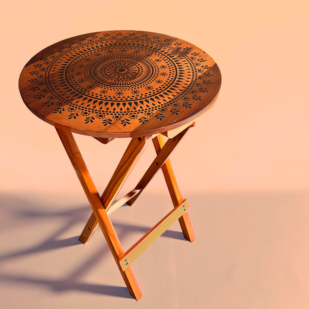 Elevate your space with the Blooming Teak Round Folding Table, a versatile piece made from 100% Teak Wood featuring exquisite Mandala Art. Use it as a coffee table, sofa side table, bed side table, or balcony accent, and enjoy easy cleaning and maintenance.