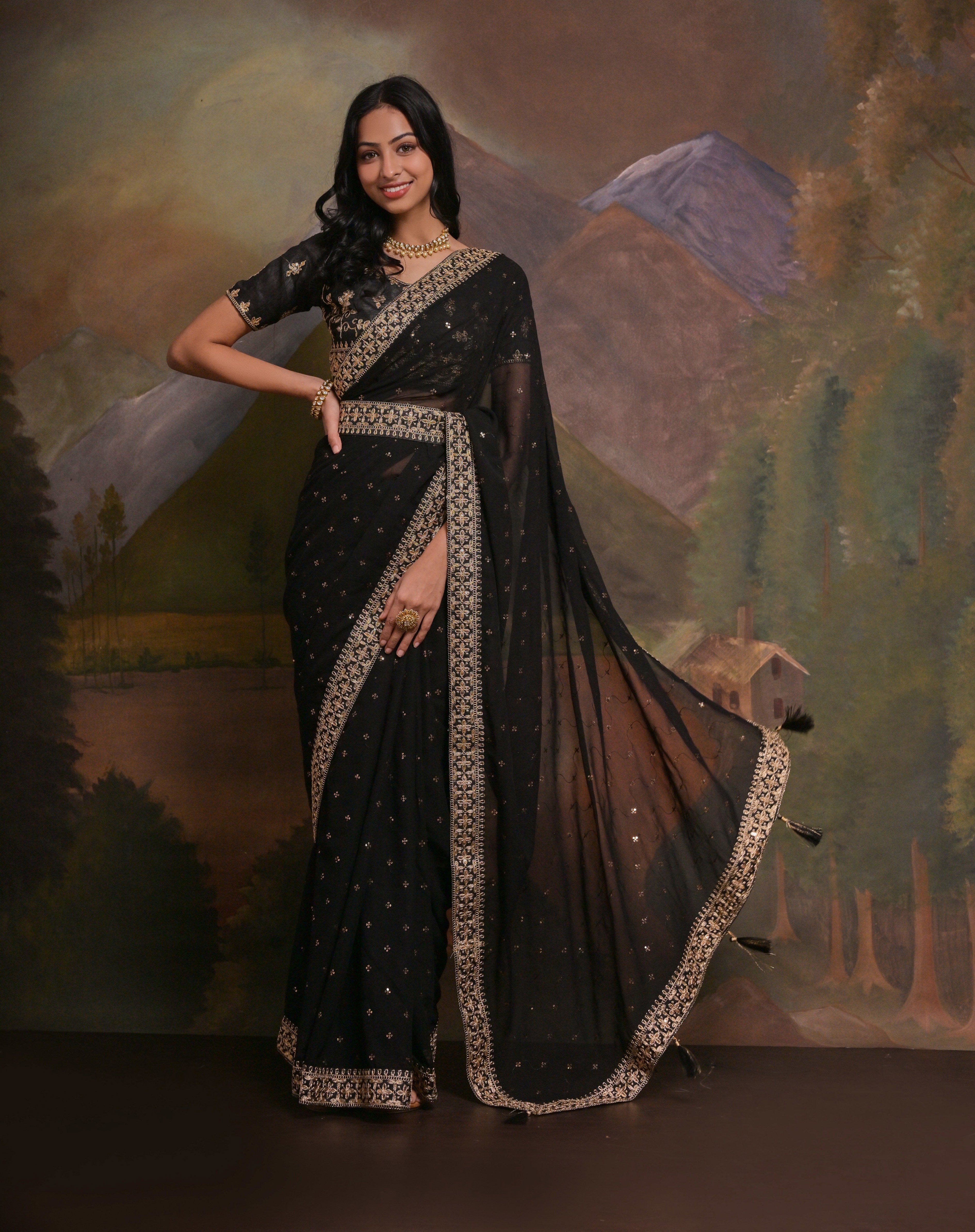 NOOR: Black georgette hand embroidered saree