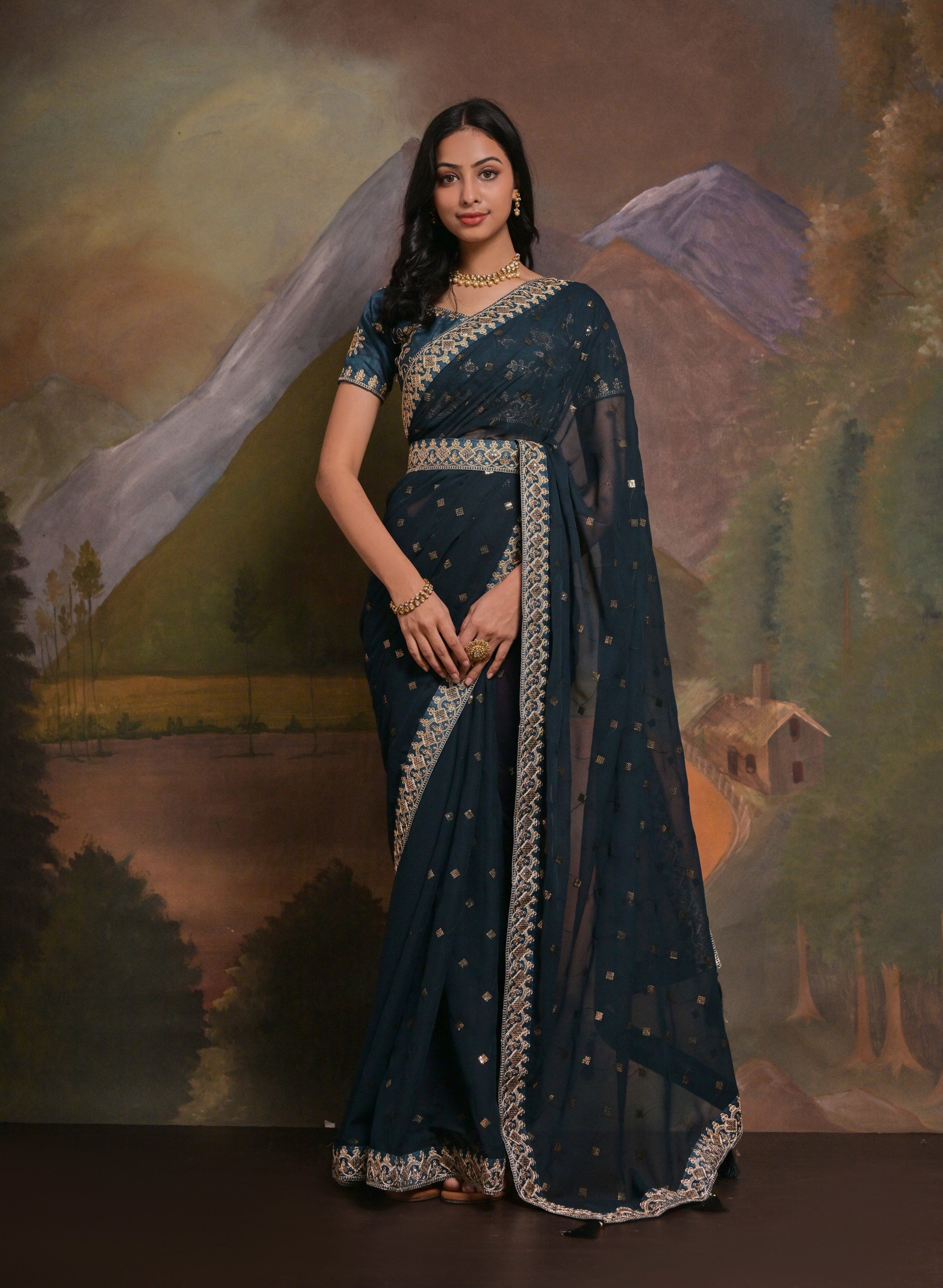 FATIMAH: Blue georgette hand embroidered saree