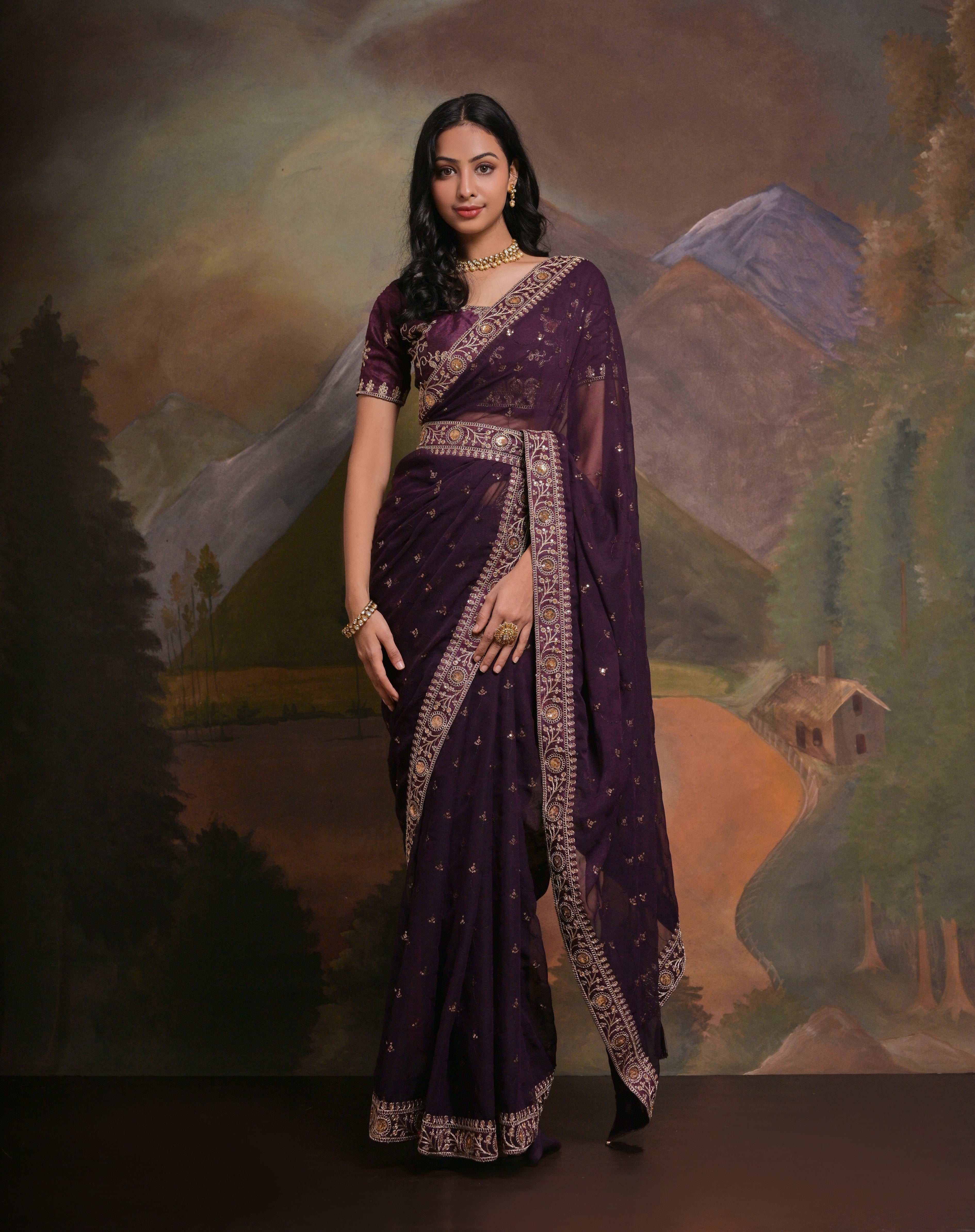 DHWANI: Purple georgette hand embroidered saree