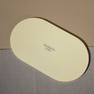 Experience the artistry of organization with the Ivory White Oval Tray, meticulously crafted from Premium Painted Wood. 