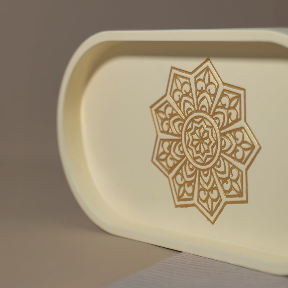 Experience the art of organization with our Ivory White Oval Tray, crafted from Premium Painted Wood. This light-weight tray, adorned with Serenity Mandala Art, serves as a stylish solution for serving and organizing, adding a touch of decor to any space.