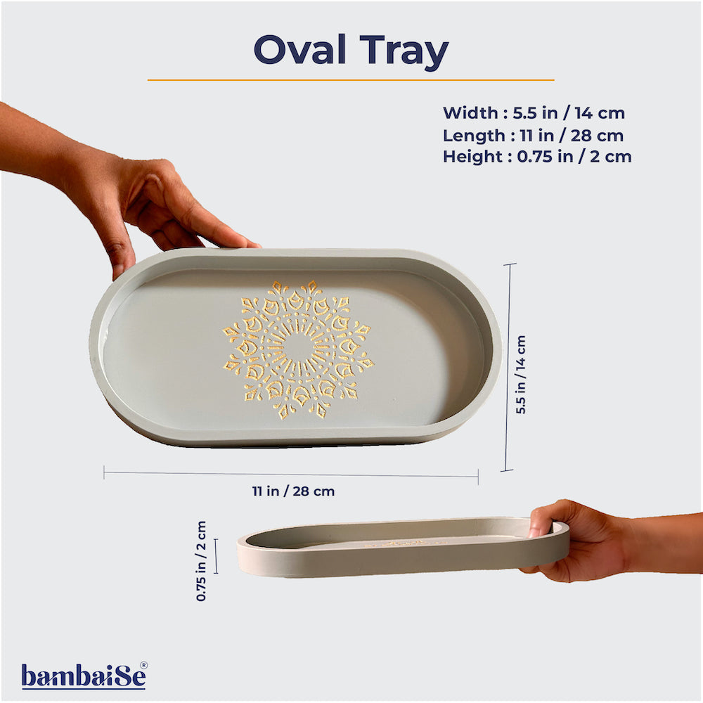 Introducing the Pebble Grey Oval Tray ‰ÛÒ a stylish and functional addition to your home. Crafted from Premium Painted Wood, this light-weight 11‰Û x 5.5‰Û tray, featuring Serenity Mandala Art, is perfect for serving, organizing, and enhancing your decor.