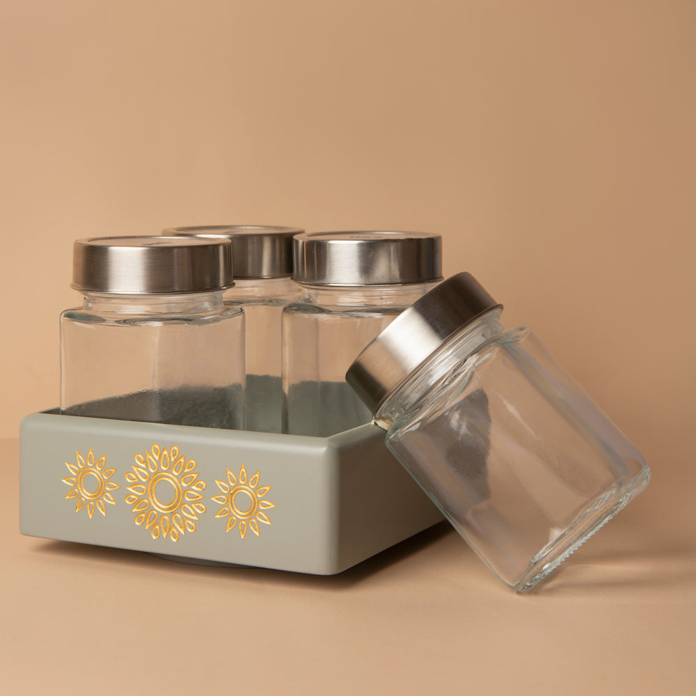 Embrace order amid chaos with our Grey Revolving Jar Tray Organizer, crafted from Premium Painted Wood. Efficiently organize four jars as it rotates 360 degrees, bringing functionality and style to your kitchen, living room, or dining table. Adorned with Serenity Mandala Art, it's a blend of practicality and elegance.