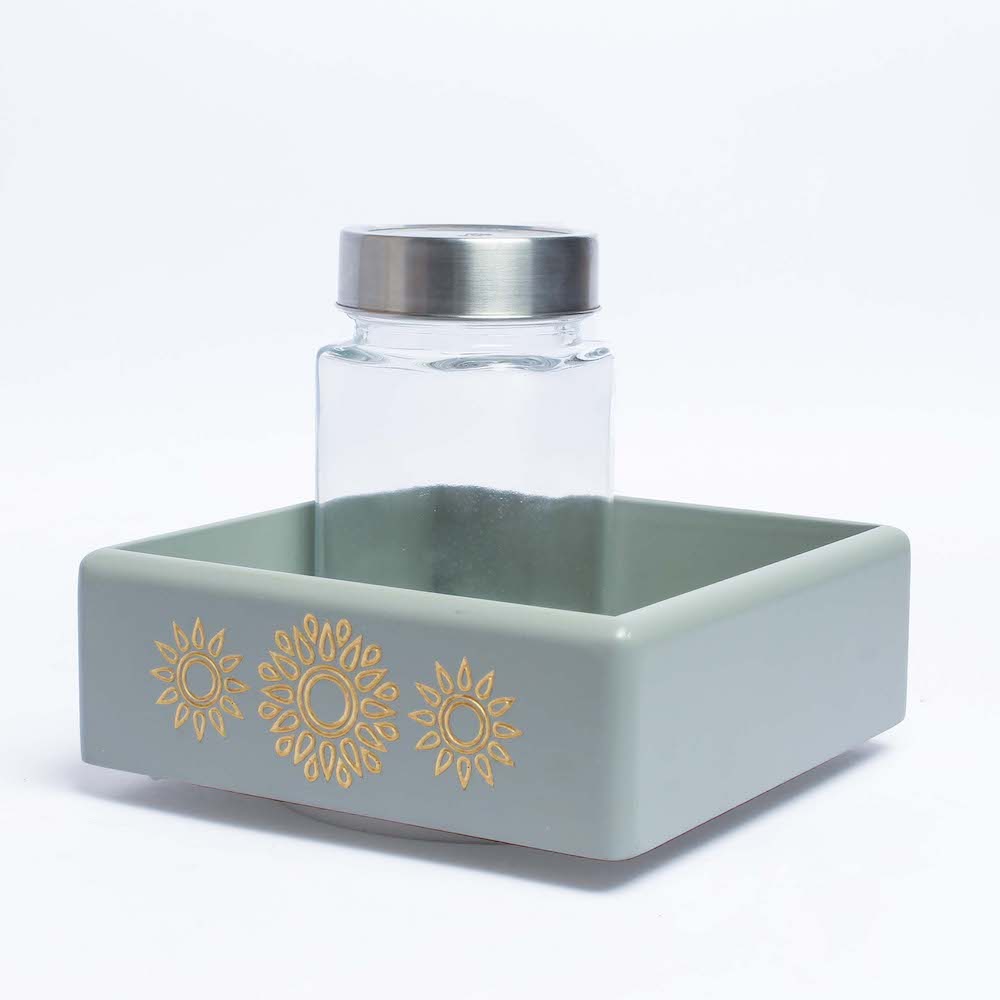 Elevate your organizational prowess with the Grey Revolving Jar Tray Organizer, meticulously crafted from Premium Painted Wood. Featuring Serenity Mandala Art, this stylish piece effortlessly organizes four jars while revolving 360 degrees. 