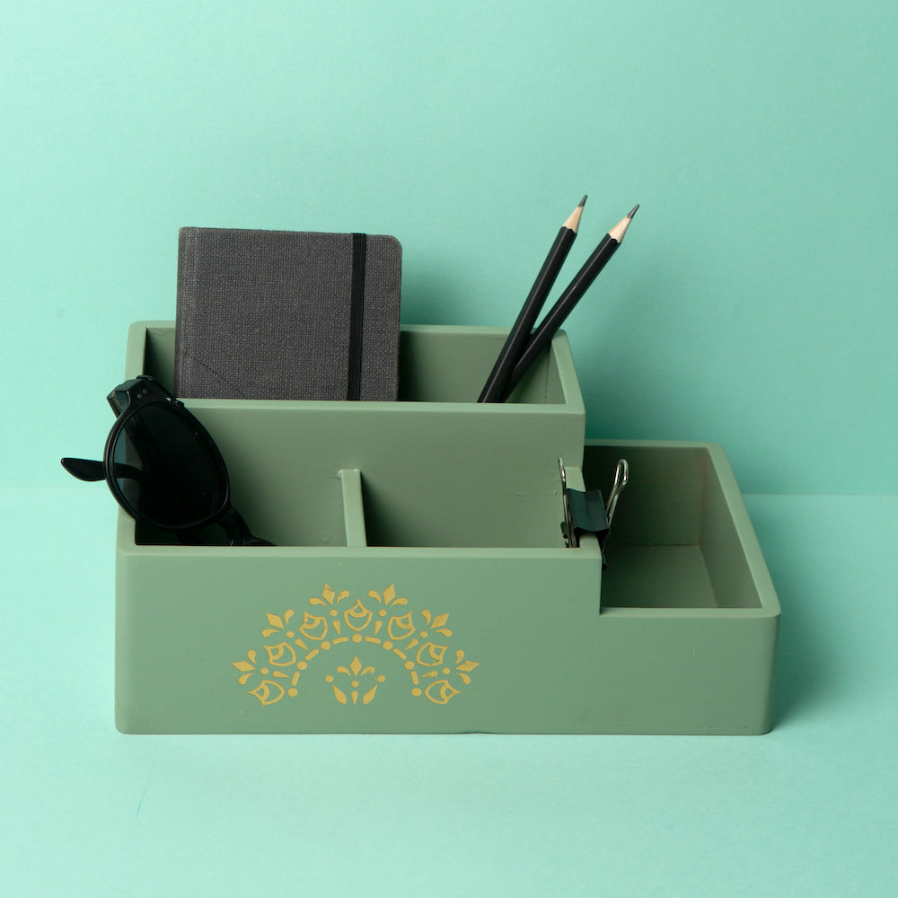 Bid farewell to clutter and embrace organization with our Pista Green Multi Organiser. This versatile storage solution is not only functional but also makes a stylish statement in your home. The calming pista green hue adds a sense of tranquility to your surroundings, while the well-organized compartments ensure everything has its place. Stay organized and chic with the Pista Green Multi Organiser, designed to meet your storage needs with flair.