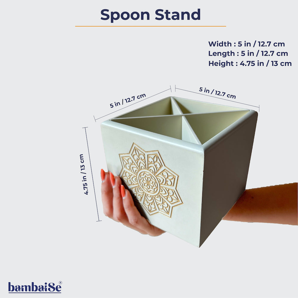 Optimize your kitchen space with the Ivory White Spoon Stand, meticulously crafted from Premium Painted Wood. Designed for easy cleaning and featuring engraved Serenity Mandal Art, this stand not only organizes your cutlery but also serves as a charming dining decor element.