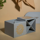 Immerse your kitchen in style with the Pebble Grey Spoon Stand, a Premium Painted Wood organizer adorned with engraved Serenity Mandal Art. Perfect for dining decor and kitchen cutlery organization, this stand's removable 4 sections ensure easy cleaning and a personalized touch to your culinary space.