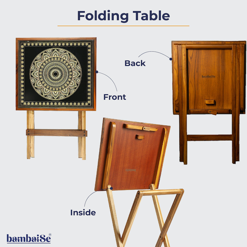 Discover tranquility in design with our Gold and Black Square Folding Table. Made from teak wood and adorned with Mandala Art. Its complete foldability ensures convenience, while easy cleaning and maintenance enhance its appeal.