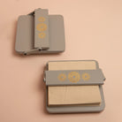 Immerse your space in elegance with the Pebble Grey Tissue Tray, a high-quality wooden organizer adorned with Serenity Mandal Art. The adjustable flap ensures square tissues stay put, offering a stylish and practical solution to maintain order in the chaos of daily life.